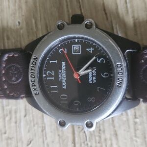 Timex Expedition watch. Date calendar feature. Brown canvas/leather strap.